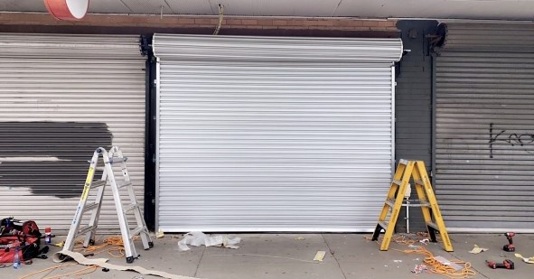 Garage door installation roller